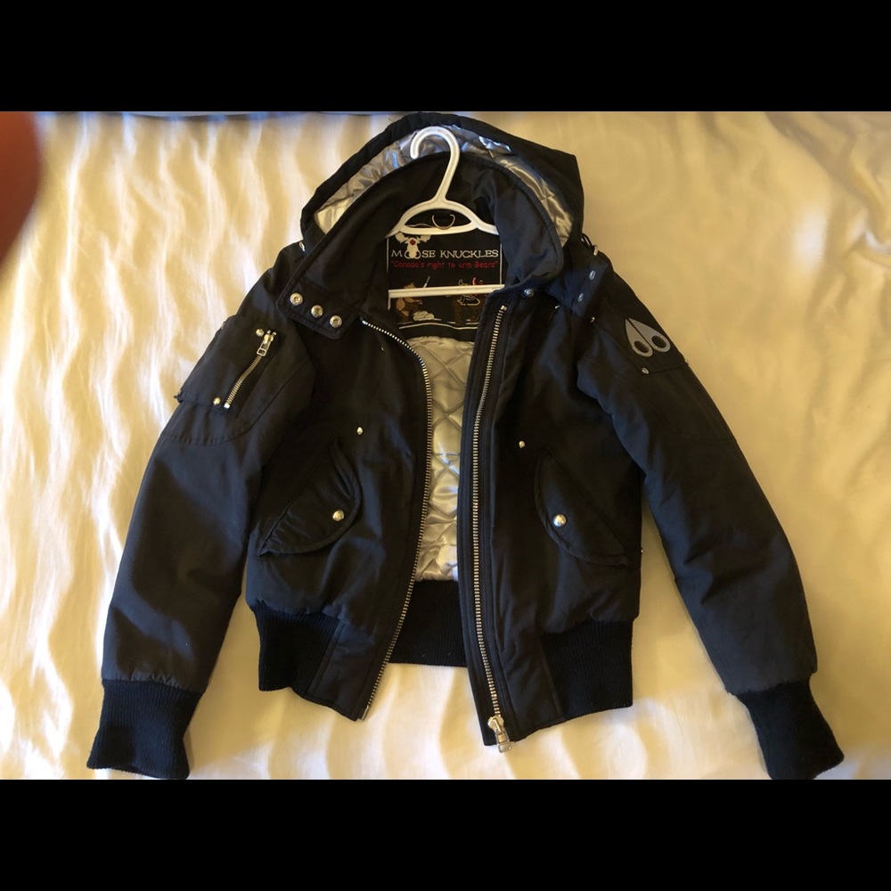 Black, size small, woman’s Moose Knuckle bomber jacket.